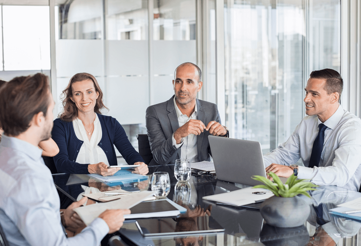 Young couple signing a contract on a meeting with investment agent in the office.